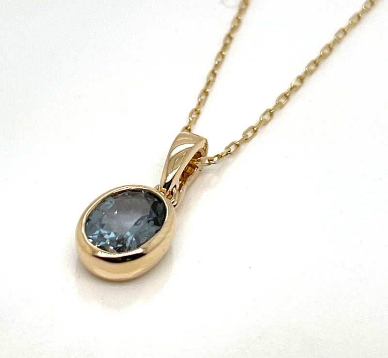 14ky Oval colored stone bezel set enhancer pendant with 18" chain